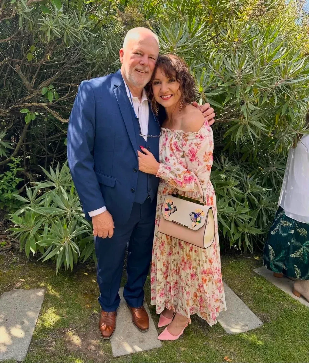 Lea-Anne and her husband KP together in a garden