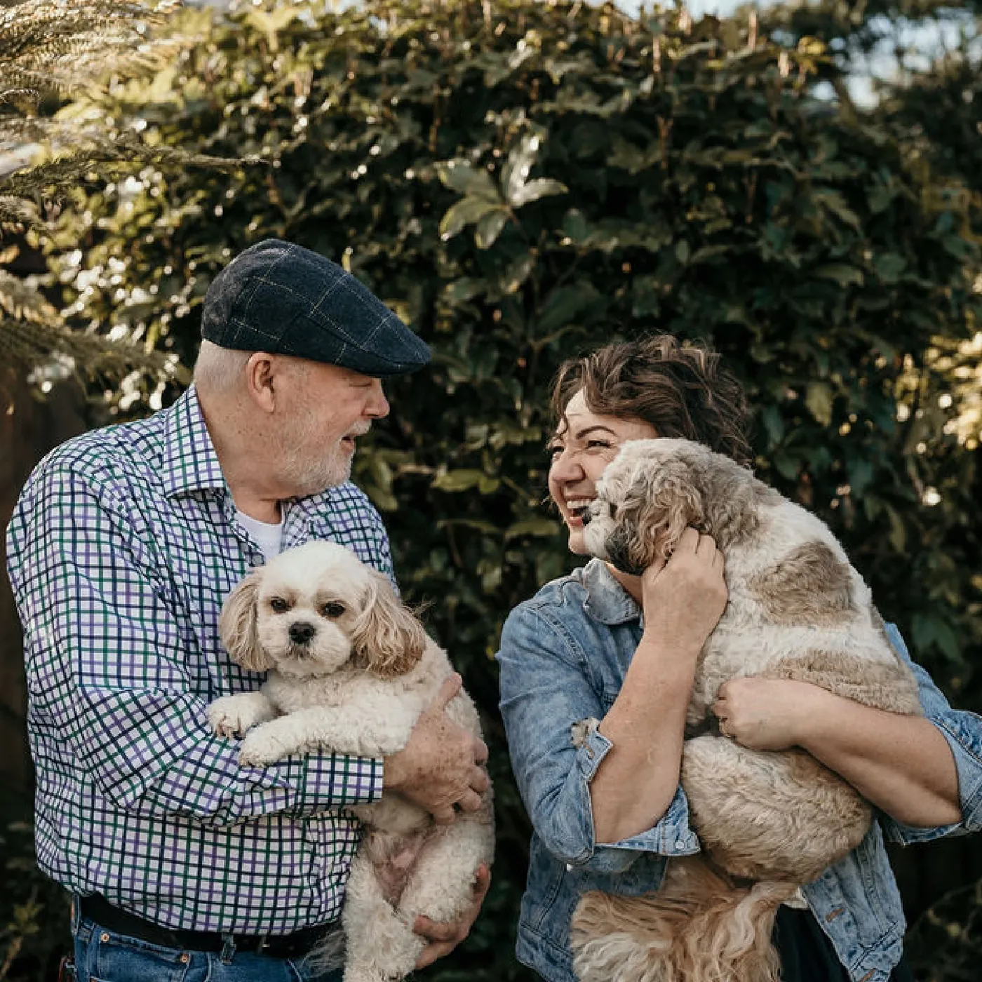 Lea-Anne and her husband KP with their two dogs